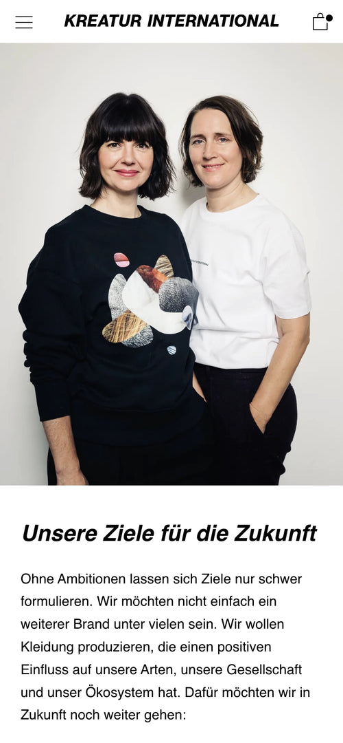 Foto von zwei Personen in bedruckten Pullovern. Text über zukünftige Ziele des Unternehmens.