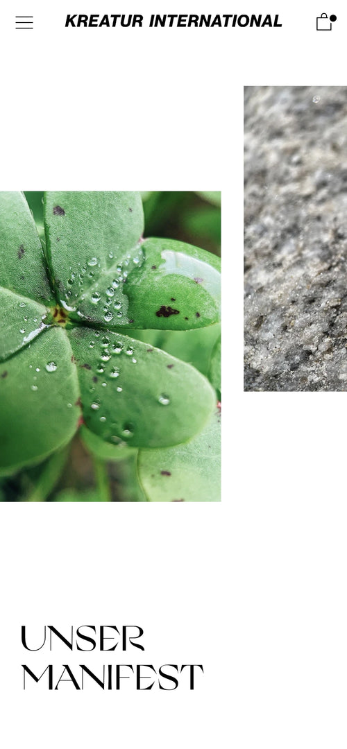 Ein Kleeblatt mit Wassertropfen und die Worte "UNSER MANIFEST" darunter.
