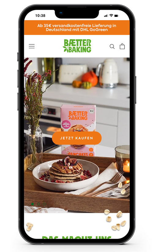 Smartphone zeigt Pancakes mit Beeren, Text darüber mit 'Jetzt kaufen' Button.