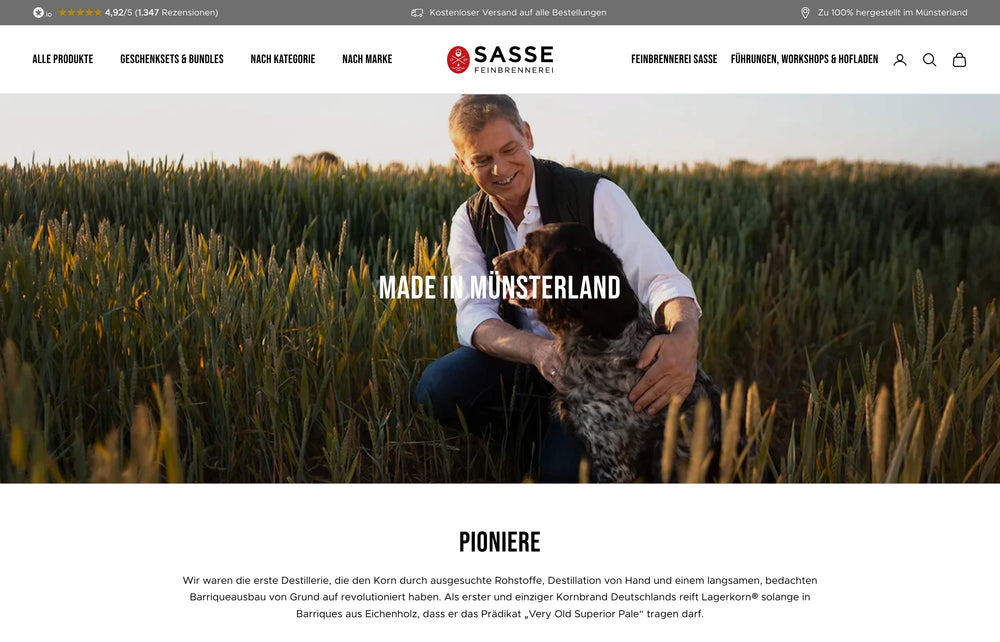 Person mit Hund im Feld, Text: "Made in Münsterland".