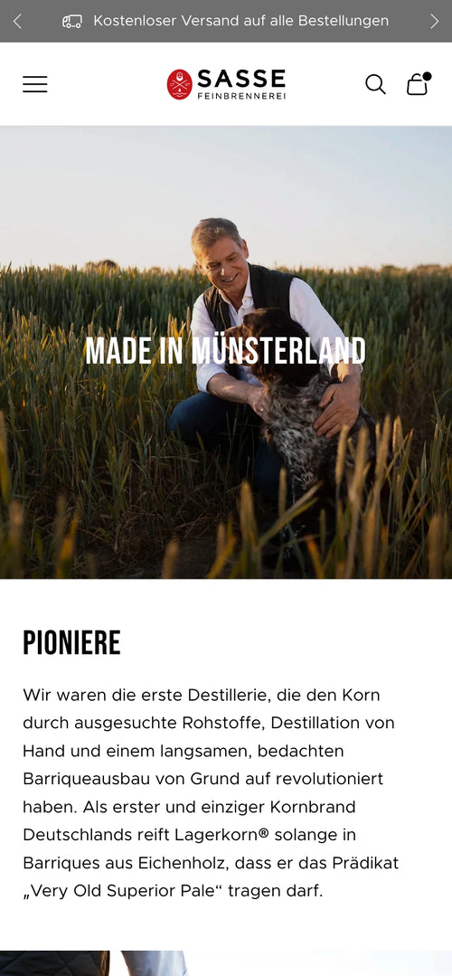 Mann im Feld, mit Hund, Text: Made in Münsterland.