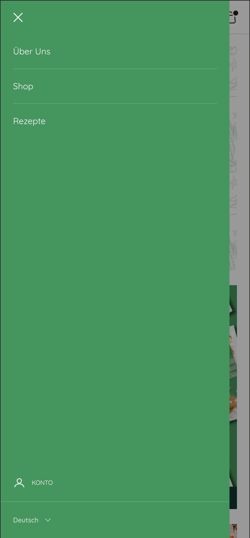 Menü mit Optionen: Über Uns, Shop, Rezepte auf grünem Hintergrund.