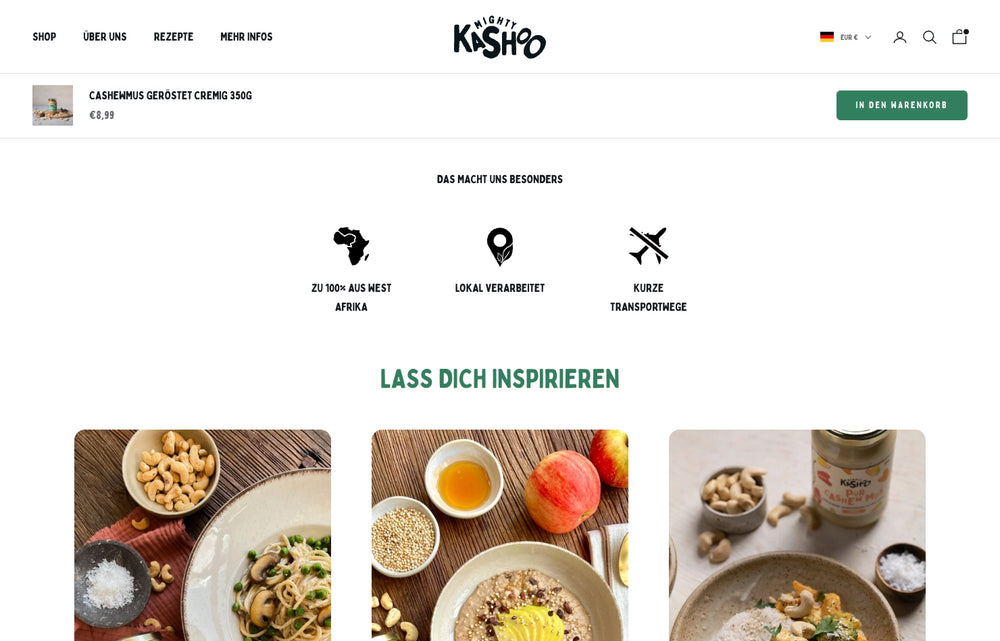 Drei Schüsseln mit Gerichten und Cashewkernen auf Holztisch.