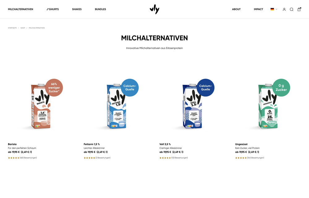 Vier Getränkekartons in Braun, Blau, Dunkelblau und Grün mit Produktinfos.